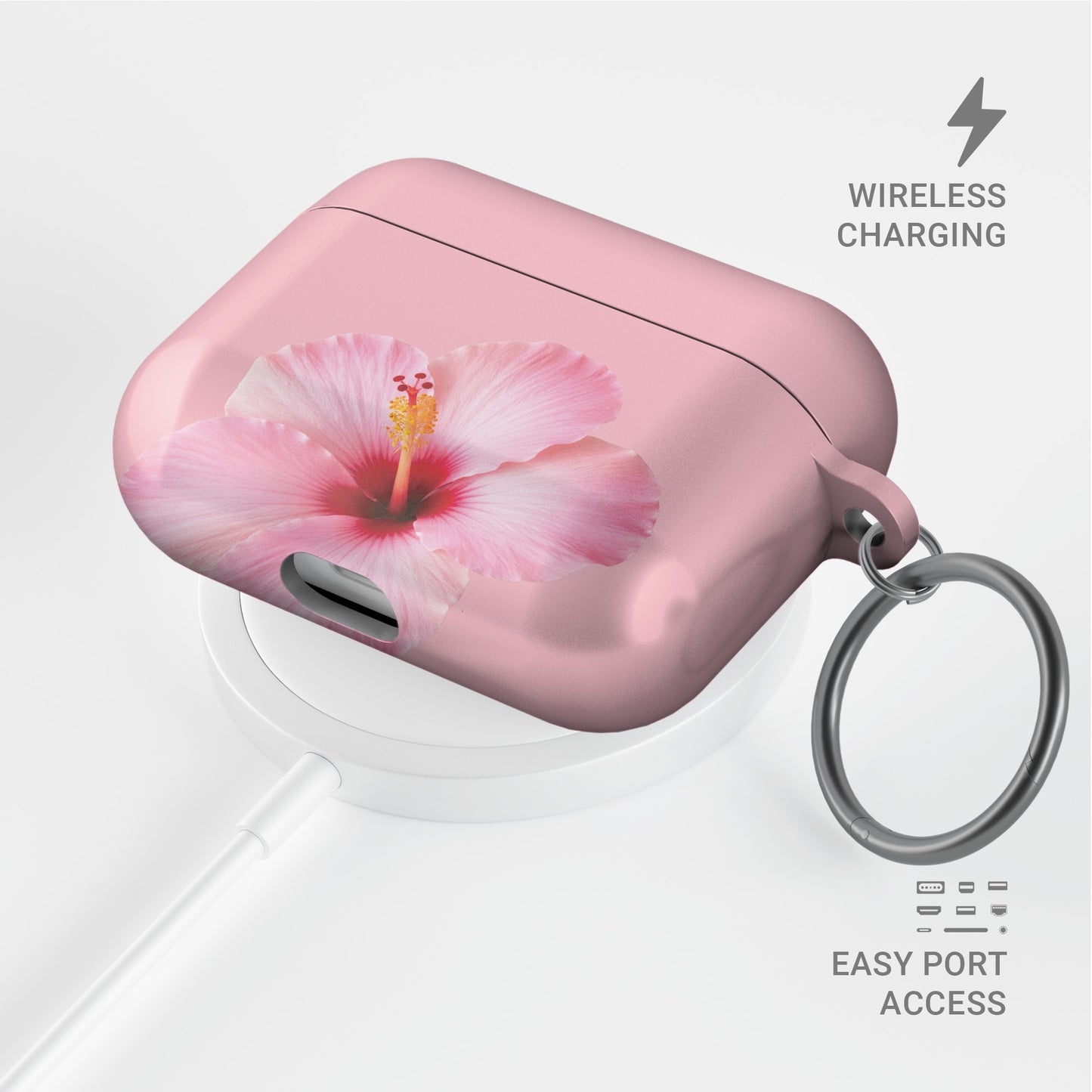 Pink hibiscus AirPods case with soft floral tropical print on a glossy Apple AirPods case by Case & Charm