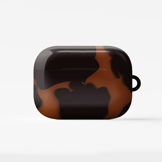 Amber Eclipse AirPods tough case with tortoiseshell pattern, dual layer design, and glossy finish for everyday protection.