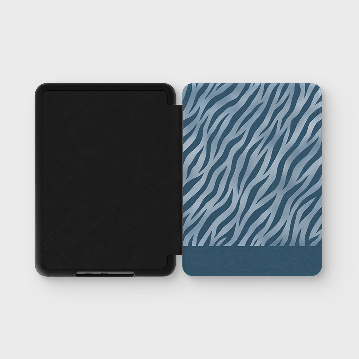 Skylark Canter Kindle Case with deep blue zebra stripes on powder blue from the Wild Atelier collection.