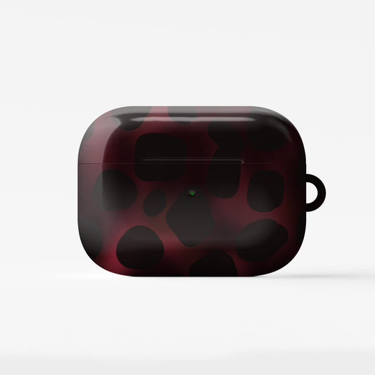 Crimson Ember AirPods tough case with deep red marble tortoise shell design, dual layer build, and glossy finish for everyday protection.