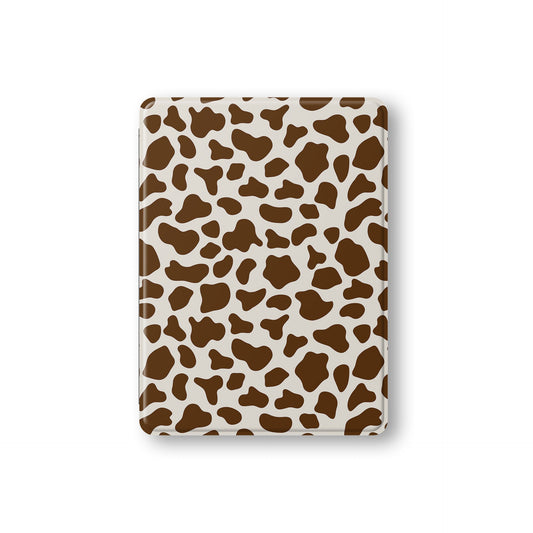 Stylish vegan leather iPad cover with brown cow print design and Apple Pencil slot