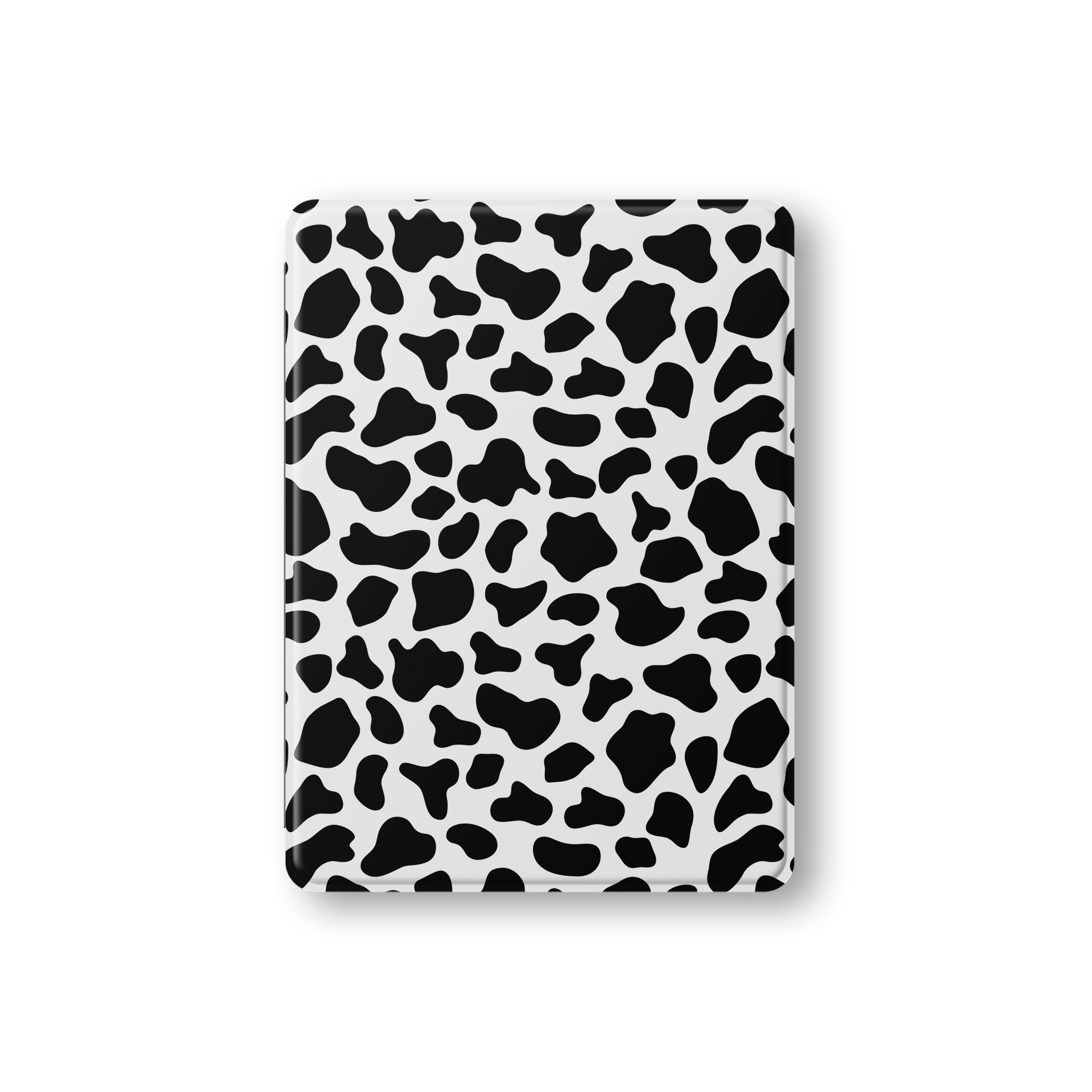 Stylish vegan leather iPad cover with monochrome cowhide pattern and Apple Pencil slot