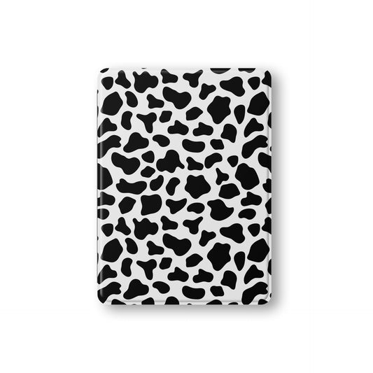 Stylish vegan leather iPad cover with monochrome cowhide pattern and Apple Pencil slot