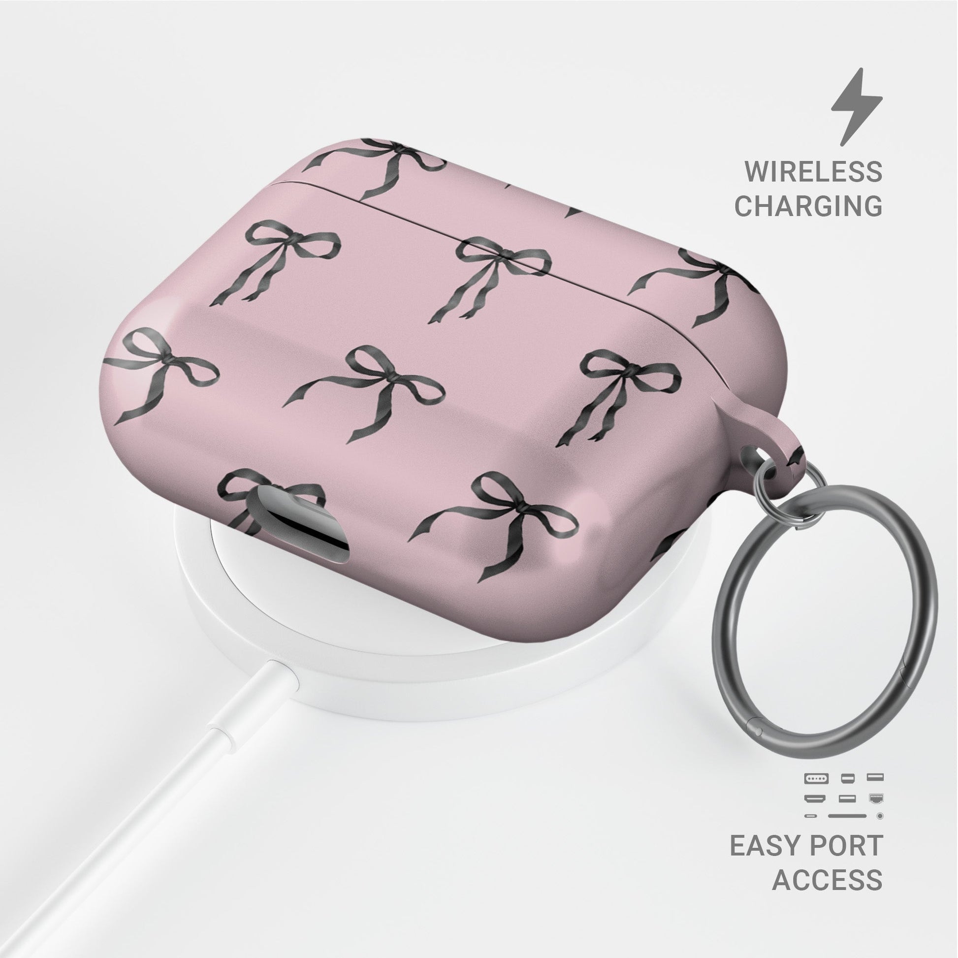 Ribbon Reverie AirPods Case – blush pink background with glossy black satin bow pattern, slim stylish protective cover for all AirPods models.