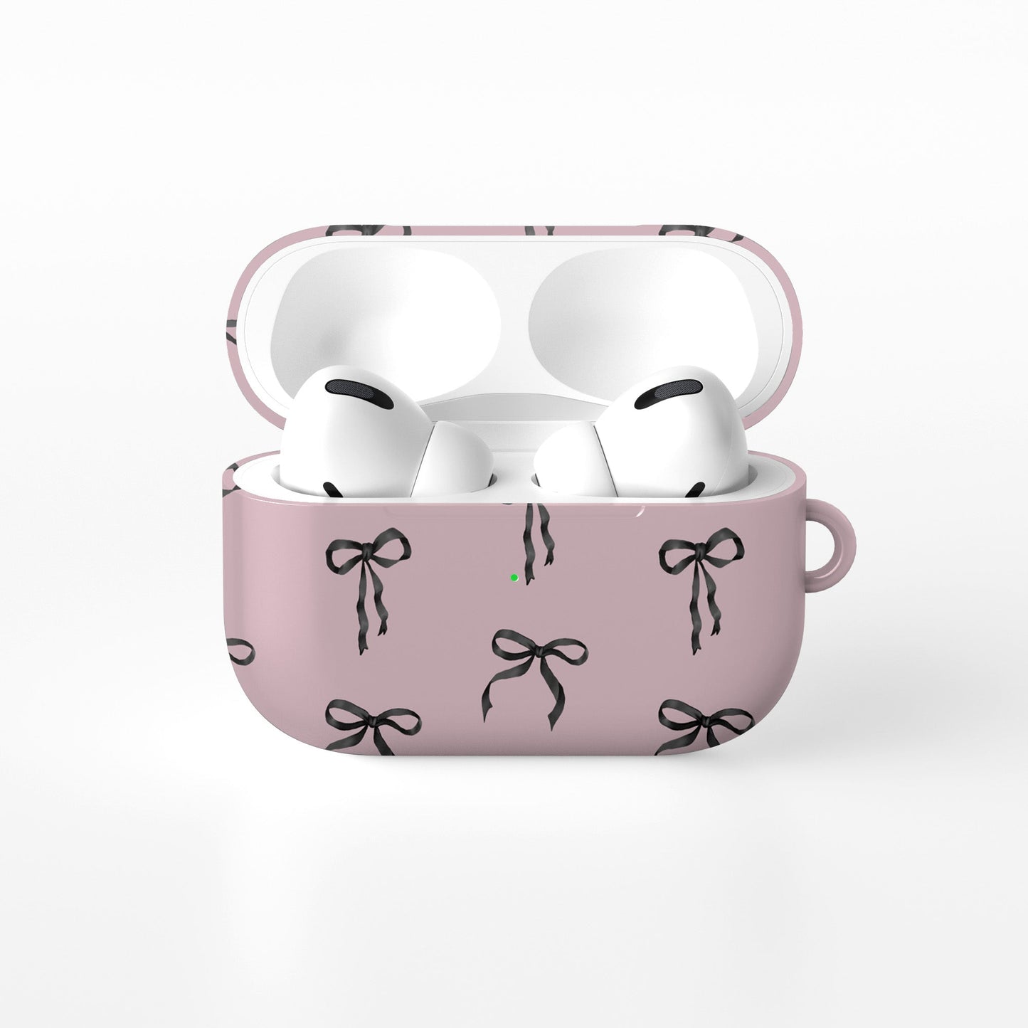 Ribbon Reverie AirPods Case – blush pink background with glossy black satin bow pattern, slim stylish protective cover for all AirPods models.
