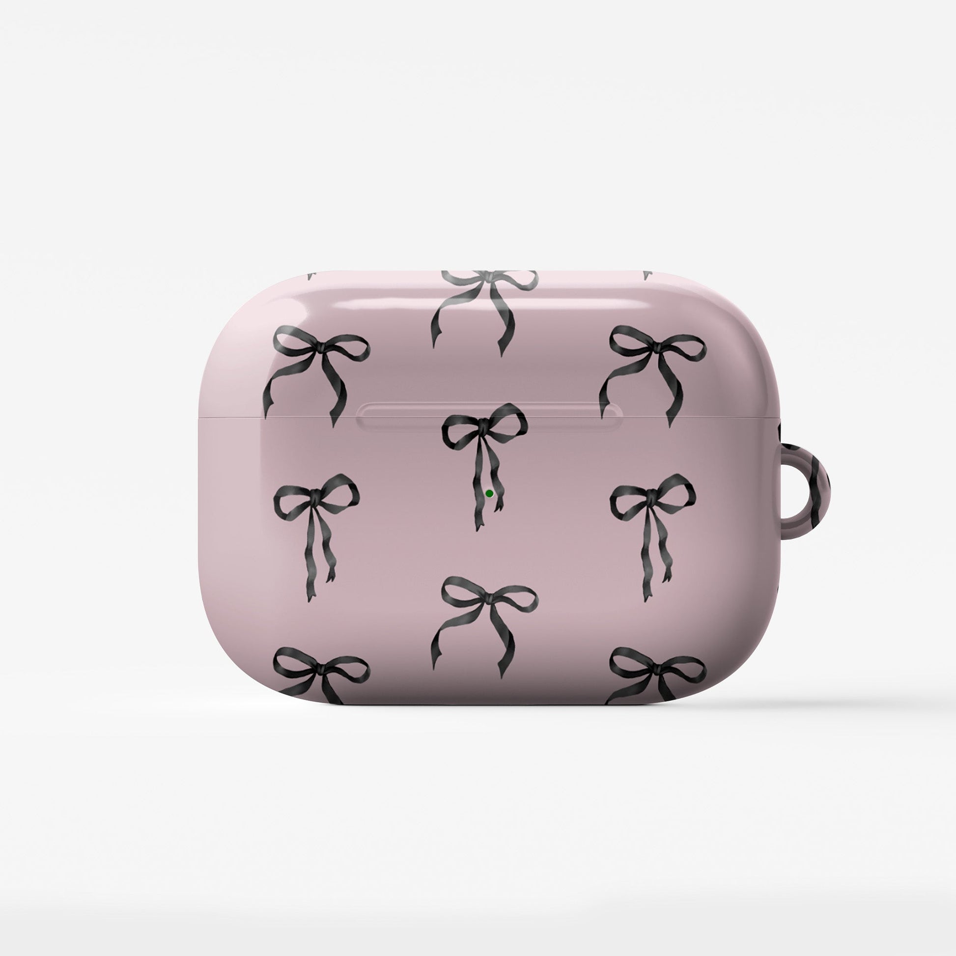 Ribbon Reverie AirPods Case – blush pink background with glossy black satin bow pattern, slim stylish protective cover for all AirPods models.
