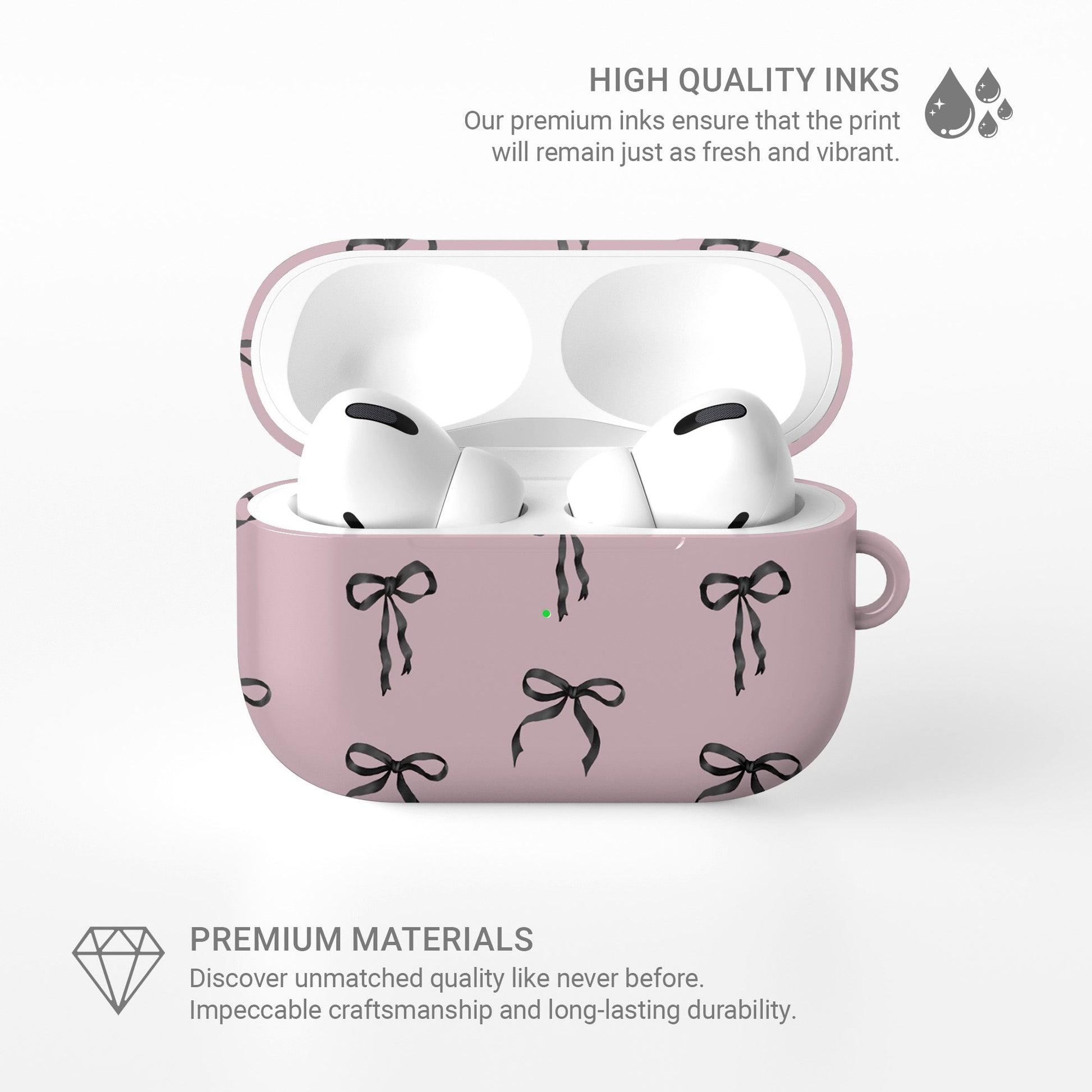Ribbon Reverie AirPods Case – blush pink background with glossy black satin bow pattern, slim stylish protective cover for all AirPods models.