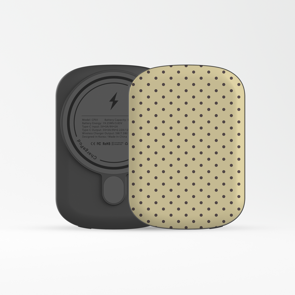 5,000 mAh portable power bank with cream and black polka dot printed shell from Case & Charm