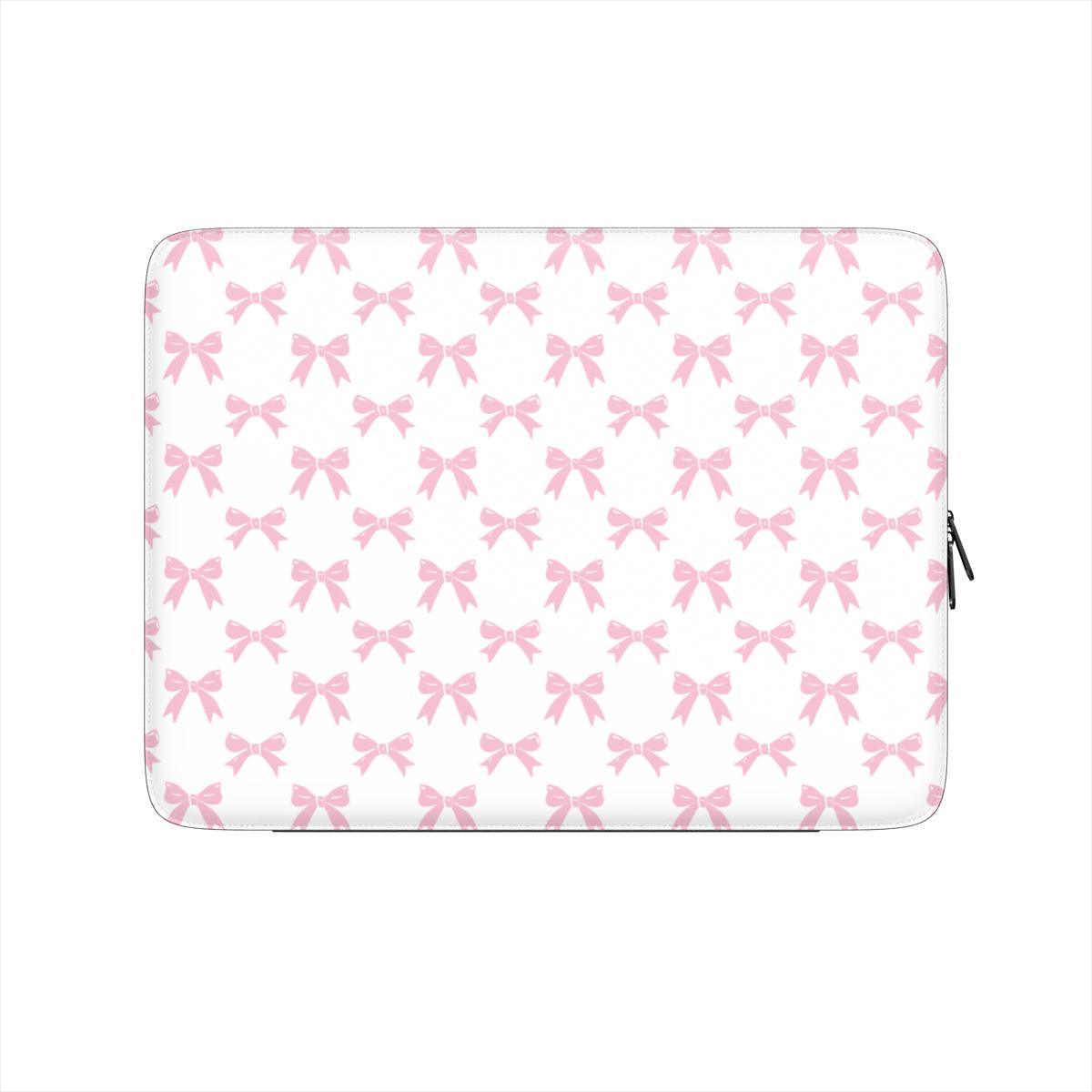 White laptop sleeve with pastel pink bow pattern and soft padded protective design