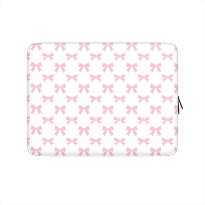 White laptop sleeve with pastel pink bow pattern and soft padded protective design