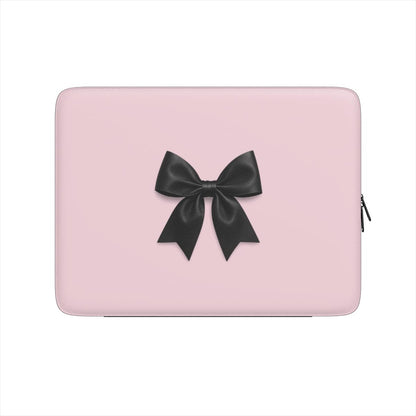 pink laptop sleeve with black satin bow design and padded protective finish