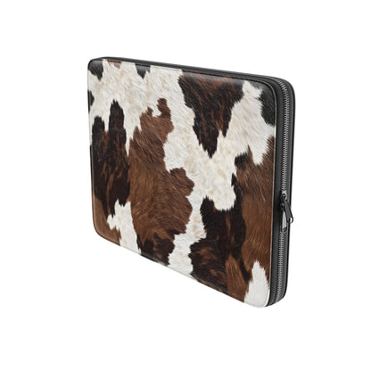 Brown and cream cow hide pattern on Hide & Seek laptop sleeve with rustic animal print texture