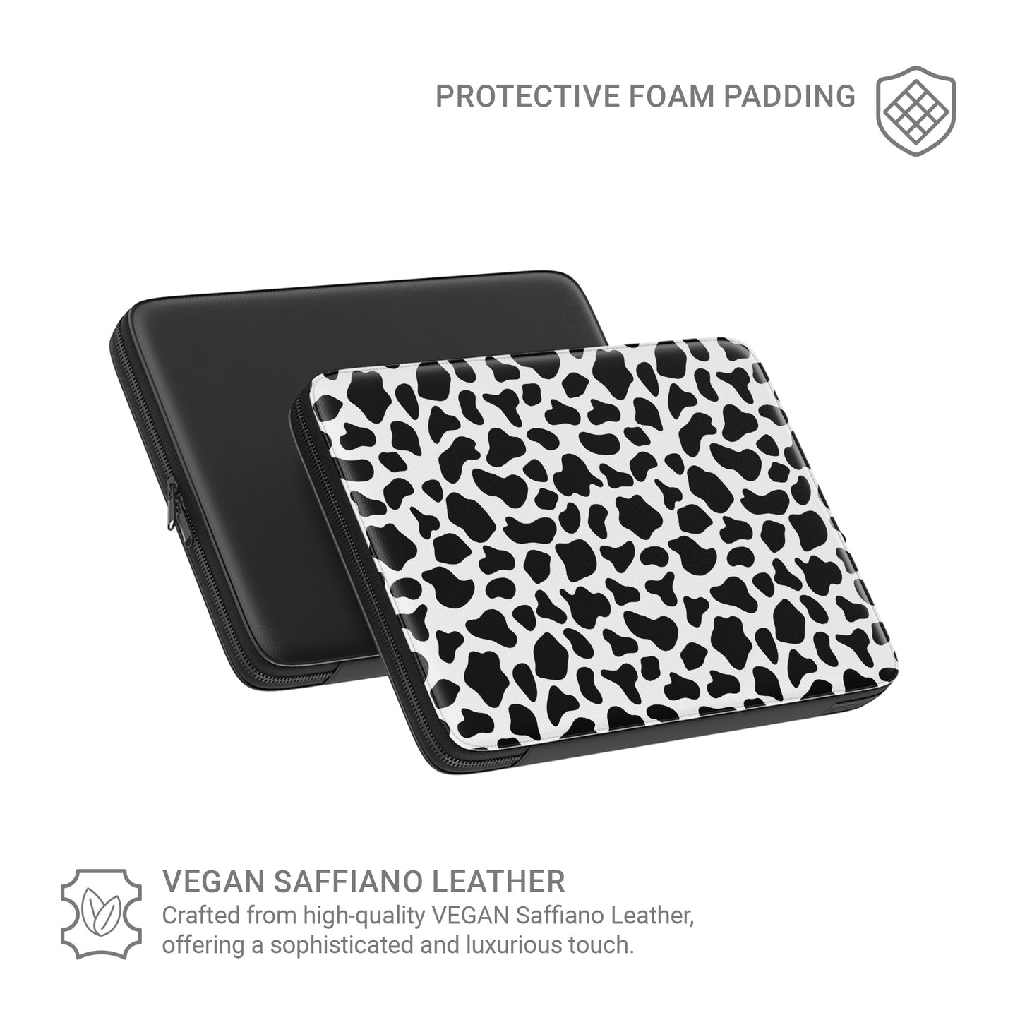 Black and white cow print pattern on Mootique Noir laptop sleeve with modern monochrome aesthetic