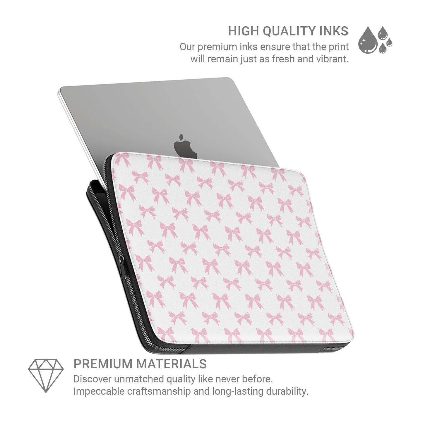 White laptop sleeve with pastel pink bow pattern and soft padded protective design
