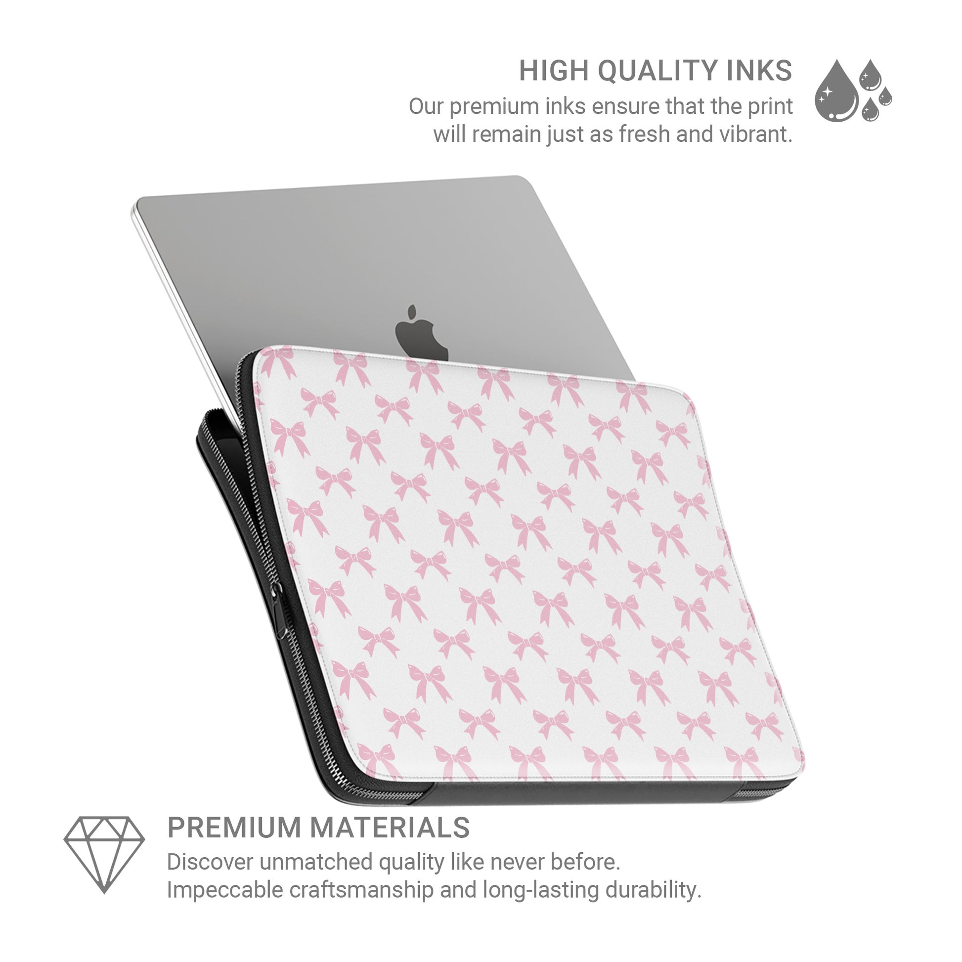 White laptop sleeve with pastel pink bow pattern and soft padded protective design