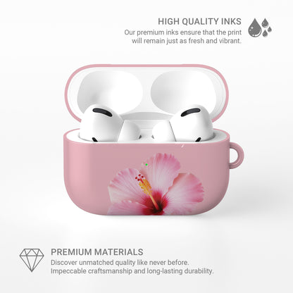 Pink hibiscus AirPods case with soft floral tropical print on a glossy Apple AirPods case by Case & Charm
