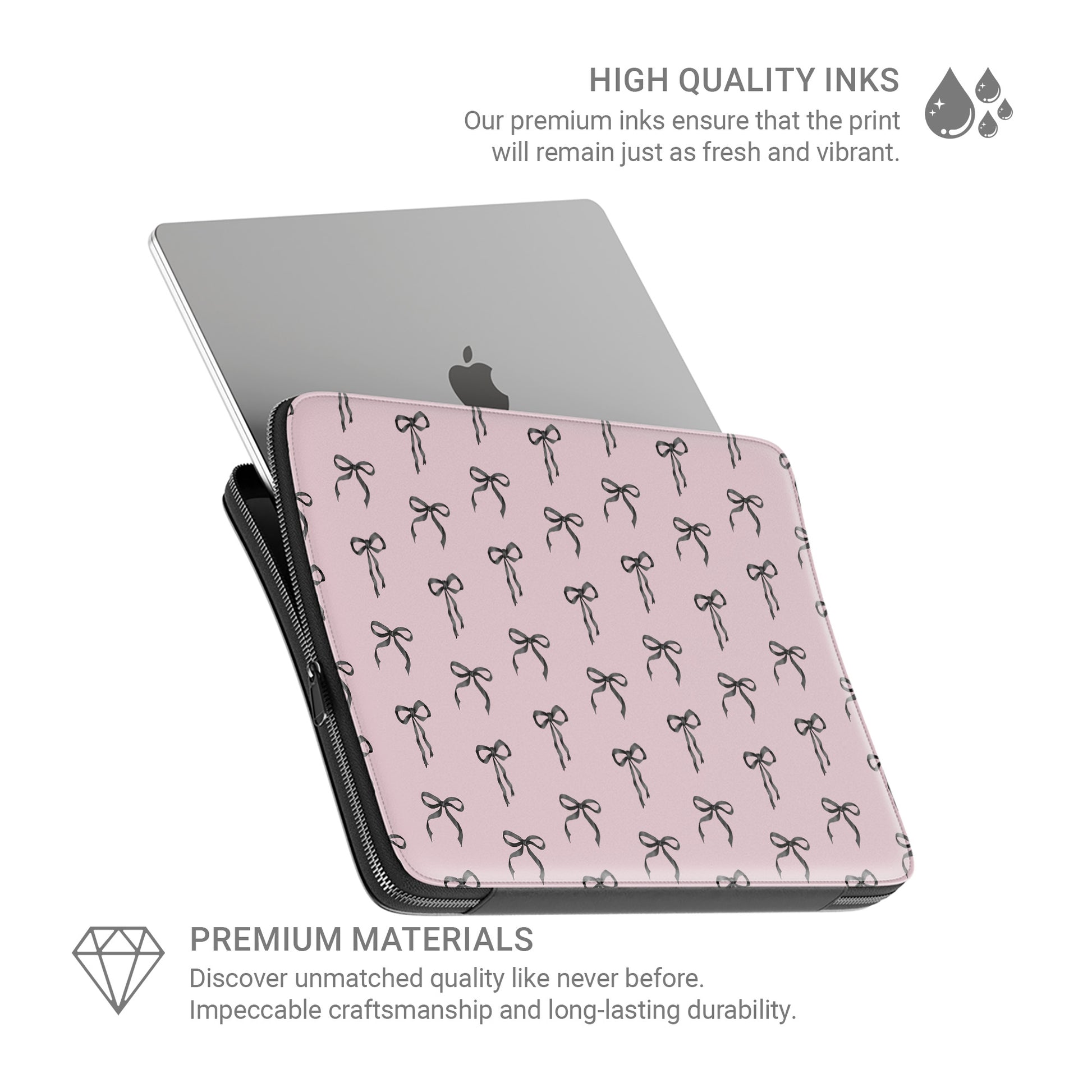 Pink laptop sleeve with black ribbon bow pattern and soft padded protective design