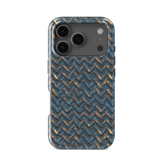 Distressed blue metal chevron pattern tough phone case with warm copper highlights and industrial texture
