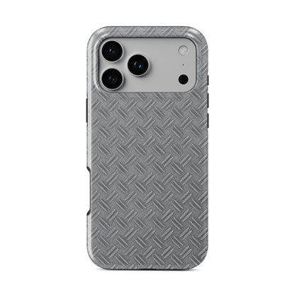 Silver tread-plate metal pattern printed on a glossy dual-layer MagSafe tough phone case with an industrial design.