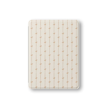 Durable iPad case with chic ribbon bow artwork and pencil holder slot