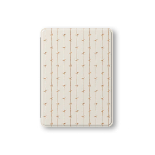 Durable iPad case with chic ribbon bow artwork and pencil holder slot