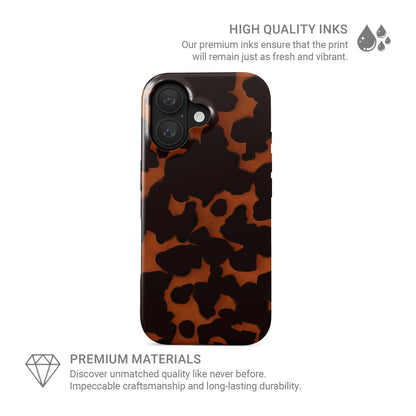 Amber Eclipse MagSafe tough phone case with tortoise shell pattern, dual layer build, and magnetic charging compatibility.