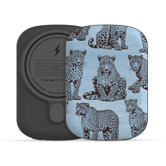 Dappled Darling Power Bank with illustrated chocolate-brown leopards on powder blue from the Wild Atelier collection.