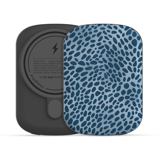 Poppy Blue Power Bank with deep blue animal spots scattered over powder blue from the Wild Atelier collection.