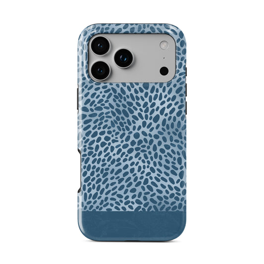 Poppy Blue MagSafe Tough Phone Case with deep blue animal spots scattered over powder blue from the Wild Atelier collection.
