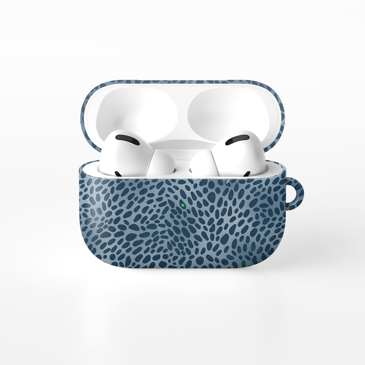 Poppy Blue AirPods Case with deep blue animal spots scattered over powder blue from the Wild Atelier collection.