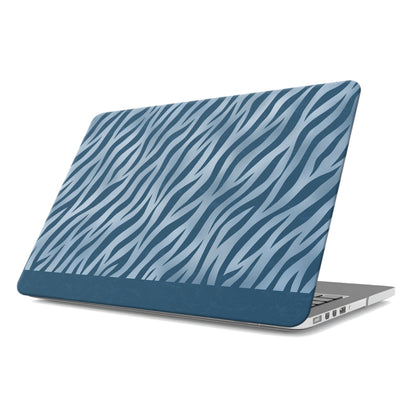 Skylark Canter MacBook Case with deep blue zebra stripes on powder blue from the Wild Atelier collection.