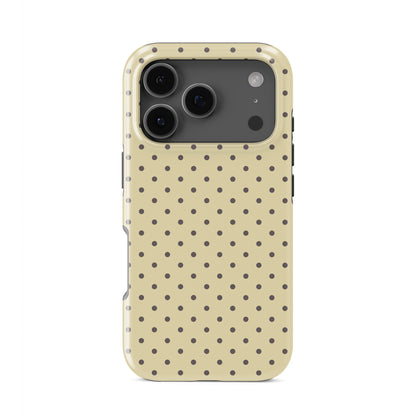 Cocoa Drops Tough Phone Case featuring small, evenly spaced cocoa-brown polka dots on a creamy vanilla background.