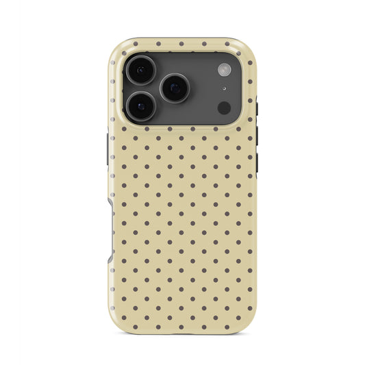 Cocoa Drops Tough Phone Case featuring small, evenly spaced cocoa-brown polka dots on a creamy vanilla background.