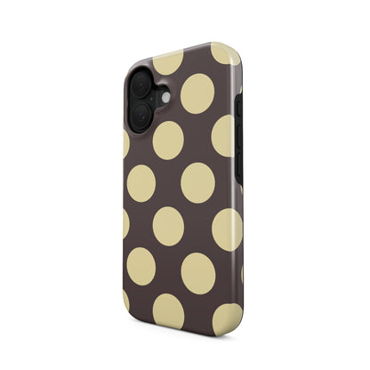 Strawberry Drops Tough Phone Case featuring small strawberry-pink polka dots on a rich cocoa-brown background.