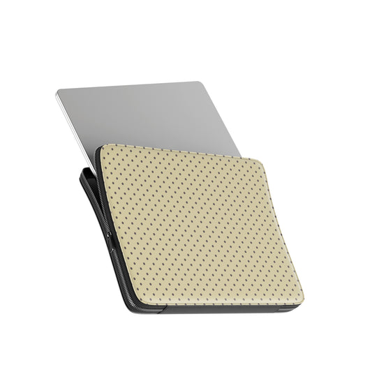 Cocoa Drops Laptop Sleeve featuring small, evenly spaced cocoa-brown polka dots on a creamy vanilla background.