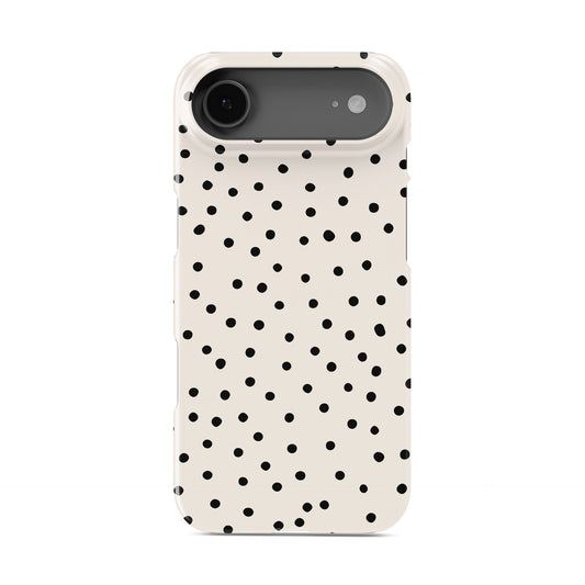 Cream snap phone case with scattered black dot pattern and minimal polka dot design