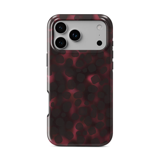Crimson Ember MagSafe tough phone case with deep red marble tortoise Shell design, dual layer build, and magnetic charging compatibility.