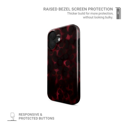 Crimson Ember MagSafe tough phone case with deep red marble tortoise Shell design, dual layer build, and magnetic charging compatibility.