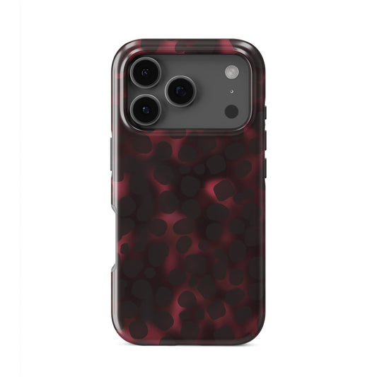 Crimson Ember tough phone case with deep red marble tortoise shell pattern, dual layer build, and glossy finish for everyday protection.