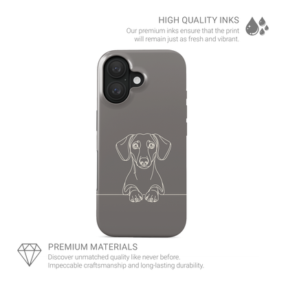 Taupe MagSafe Tough phone case with pale Dachshund line art, long ears and paws resting on a fine horizontal line.
