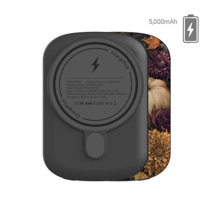 Autumn Garden power bank with cream pumpkins, burgundy flowers and trailing foliage on a dark botanical background.