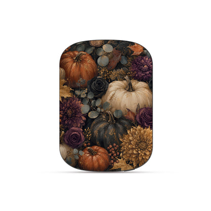 Autumn Garden power bank with cream pumpkins, burgundy flowers and trailing foliage on a dark botanical background.