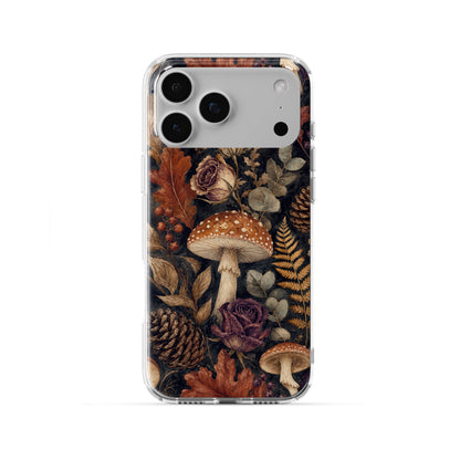 Woodland Forage Clear phone case with mushrooms, ferns, pinecones and botanical foliage on a dark woodland background.