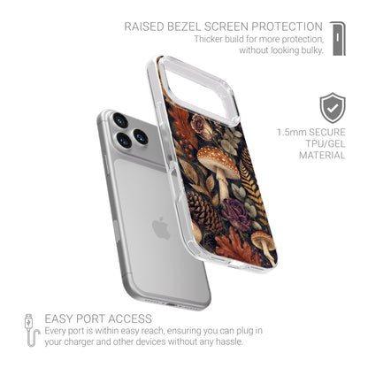 Woodland Forage Clear phone case with mushrooms, ferns, pinecones and botanical foliage on a dark woodland background.
