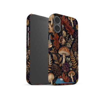 Woodland Forage Card-Holder phone case with mushrooms, ferns, pinecones and botanical foliage on a dark woodland background.