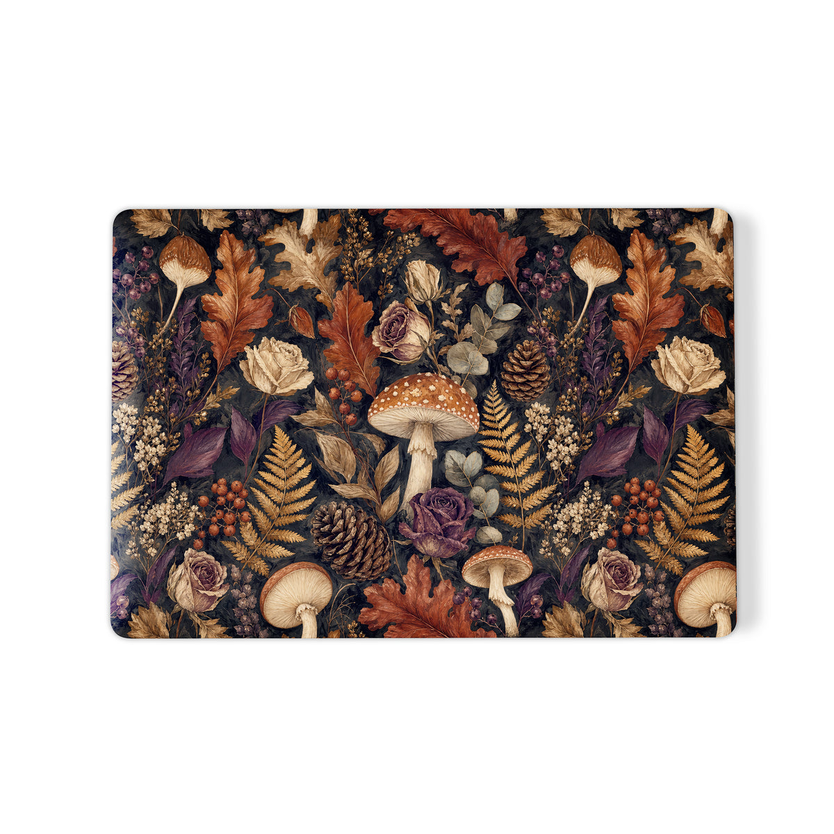 Woodland Forage MacBook shell with mushrooms, ferns, pinecones and botanical foliage on a dark woodland background.