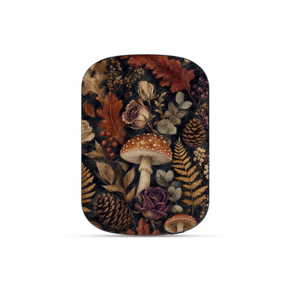 Woodland Forage power bank with mushrooms, ferns, pinecones and botanical foliage on a dark woodland background.