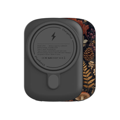 Woodland Forage power bank with mushrooms, ferns, pinecones and botanical foliage on a dark woodland background.