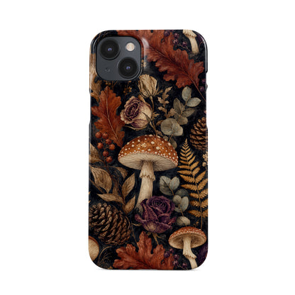 Woodland Forage Snap phone case with mushrooms, ferns, pinecones and botanical foliage on a dark woodland background.