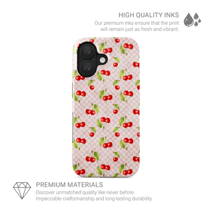 Cherry Jubilee MagSafe Tough Phone Case with scattered watercolour red cherries on soft pink gingham
